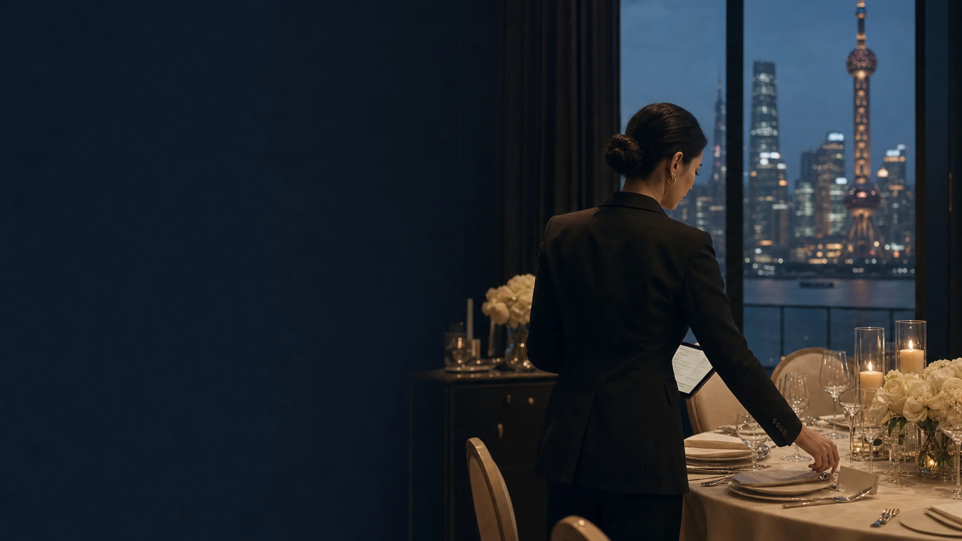 ASI PRIME producer checks event readiness against evening Shanghai skyline